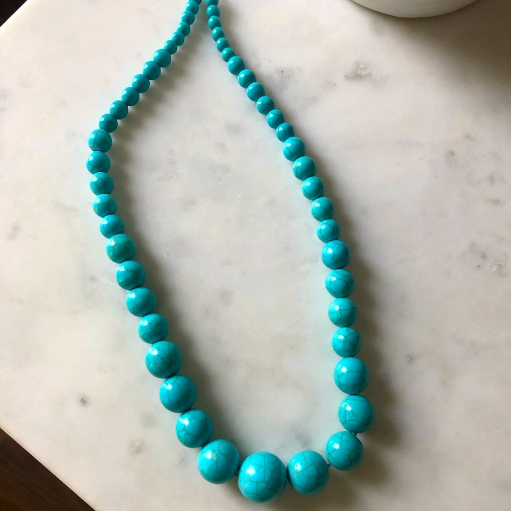 Turquoise colored beaded necklace